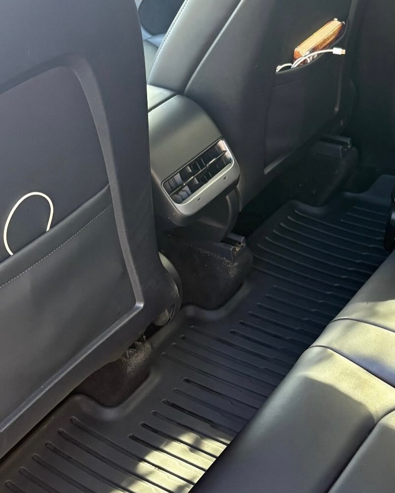 After: the Tesla's rear footwell mats, clean